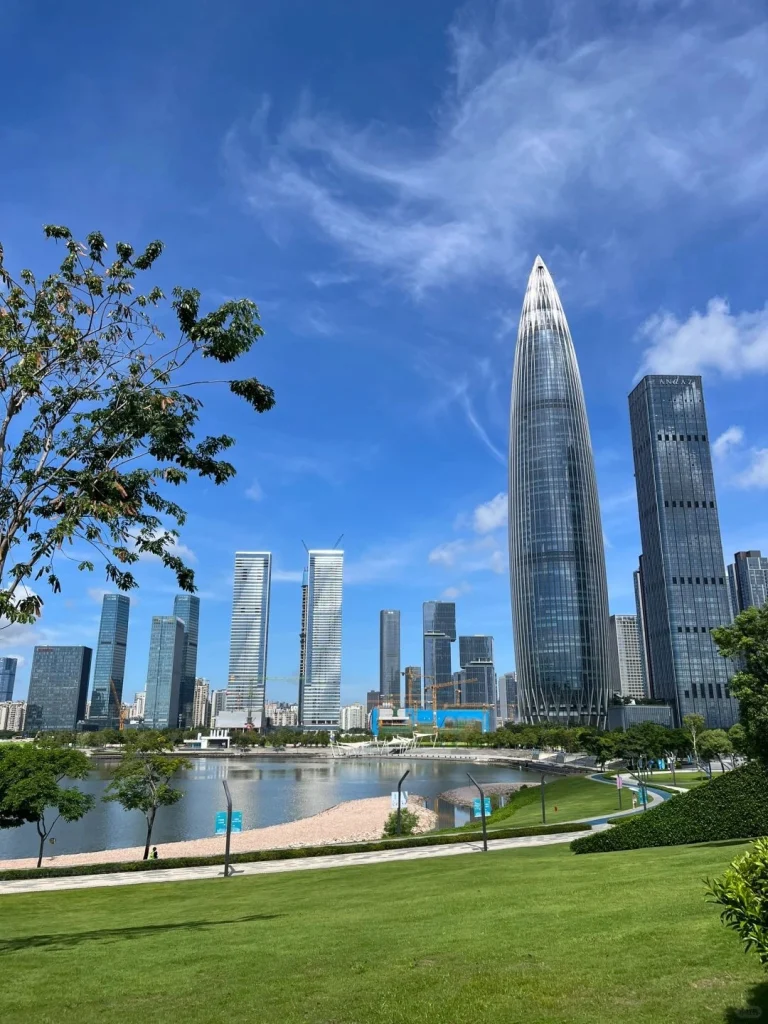 Futuristic skyline of Shenzhen with iconic skyscrapers in sunny blue sky