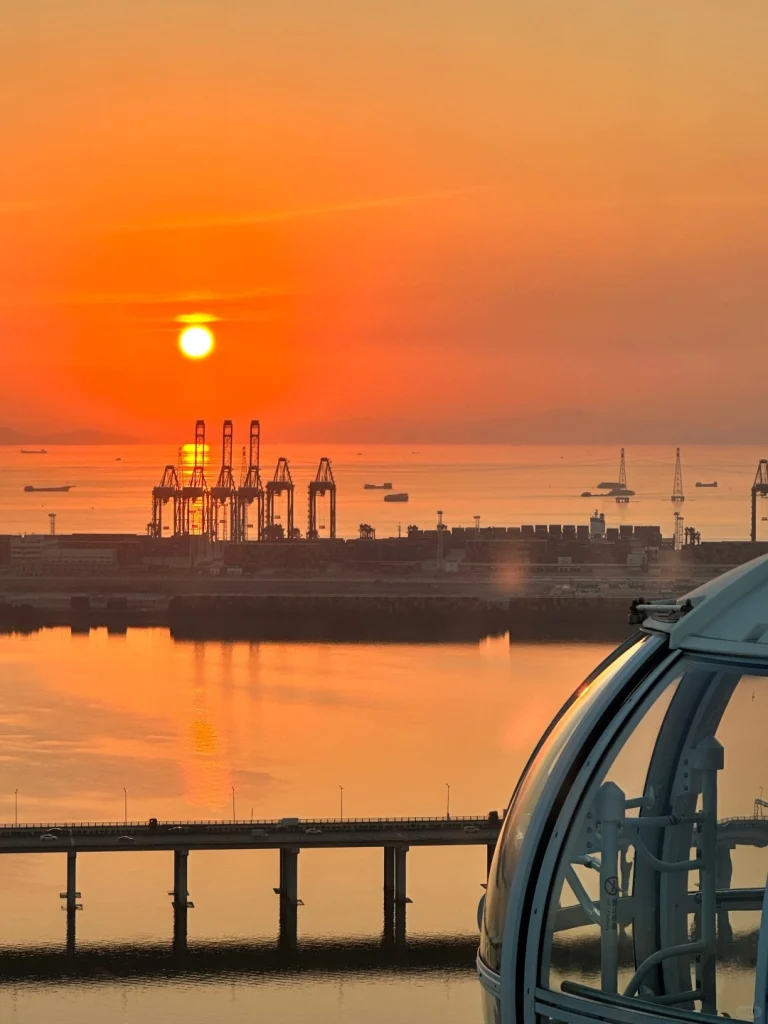 Sunset view from Shenzhen with orange sky and ocean