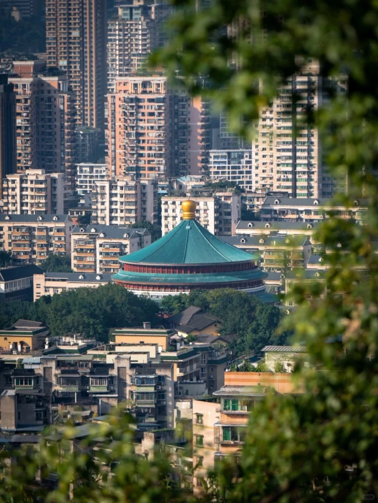 Chongqings urban skyline with the Great Hall of the People dome surrounded by residential buildings