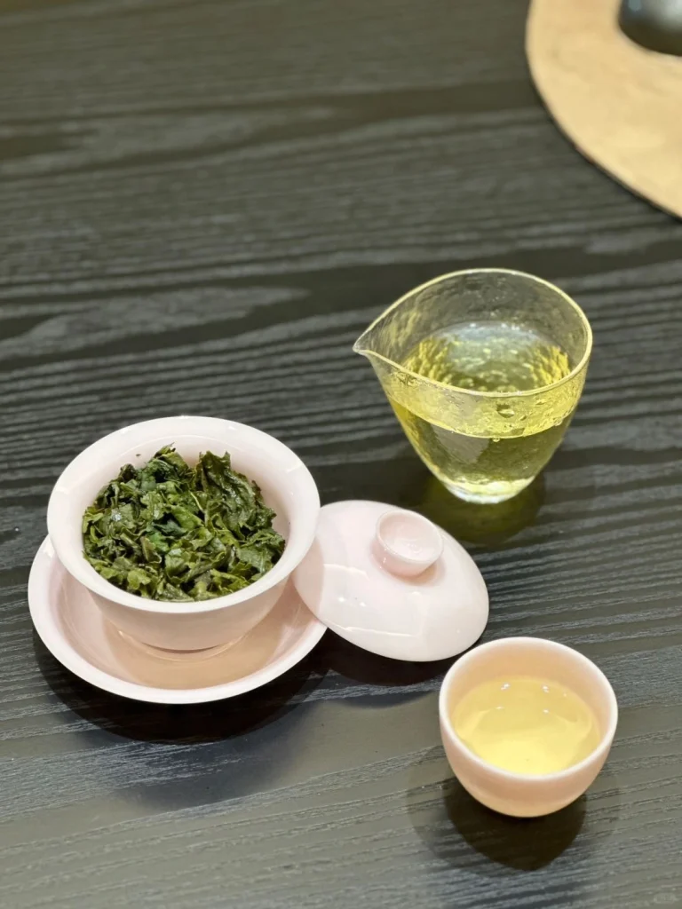 Tieguanyin Tea Brewed in a Pink Ceramic Gaiwan with Tea Cup
