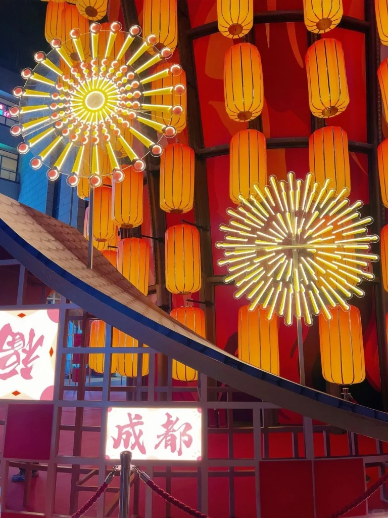 Close up of illuminated decorations and traditional red lanterns at a Chengdu festival