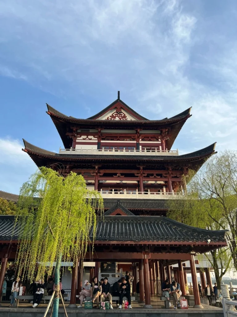 Dufu Pavilion Changsha China Visitors relaxing near Dufu Pavilion an ancient architectural site in Changsha surrounded by lush greenery