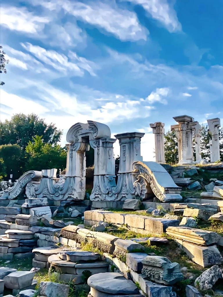 Ruins of the Old Summer Palace Beijing Majestic ruins of the Old Summer Palace Yuanmingyuan in Beijing China under a blue sky