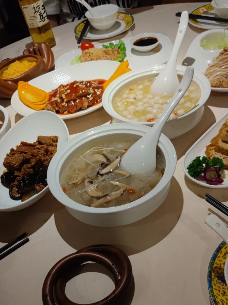 A beautifully arranged table with Gong Delins signature vegetarian dishes representing traditional Chinese culinary art