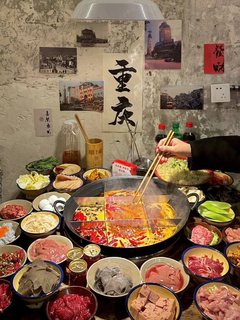 Chongqing community hotpot Vibrant spicy broth filled with meats and fresh vegetables