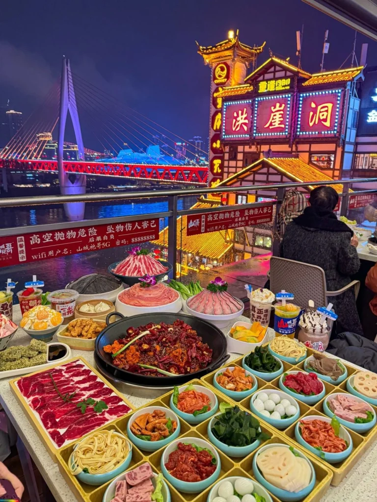 Chongqing mountain city hotpot Spicy hotpot with an array of fresh ingredients and chili peppers