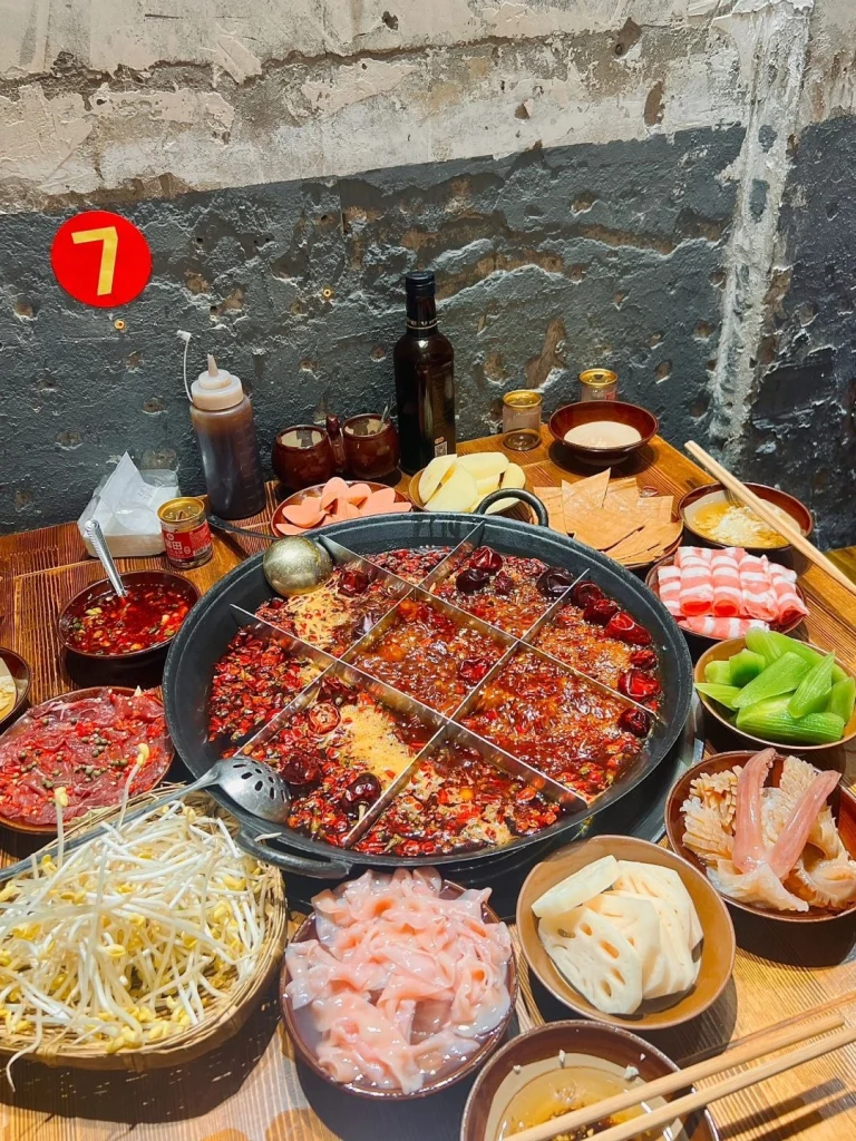 Chongqing traditional hotpot A spicy experience with fresh ingredients served in a traditional hotpot