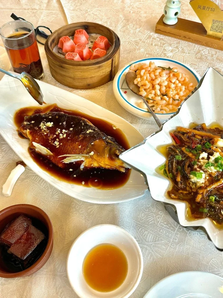 Close up of Lou Wai Lous signature dish the West Lake vinegar fish served on a white plate