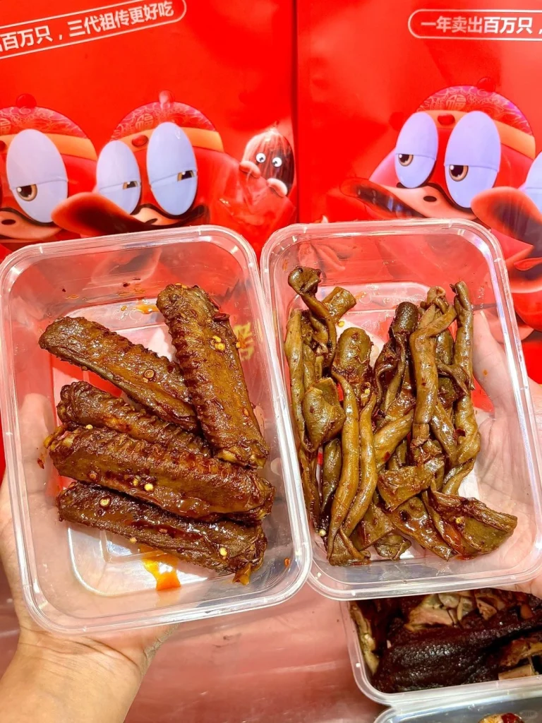 Close up of Zhang Yazi spicy duck products in containers