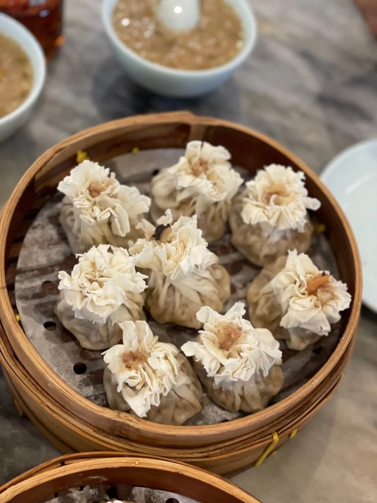 Close up view of dumplings served at Du Yi Chu restaurant in Beijing capturing their intricate design and flavors