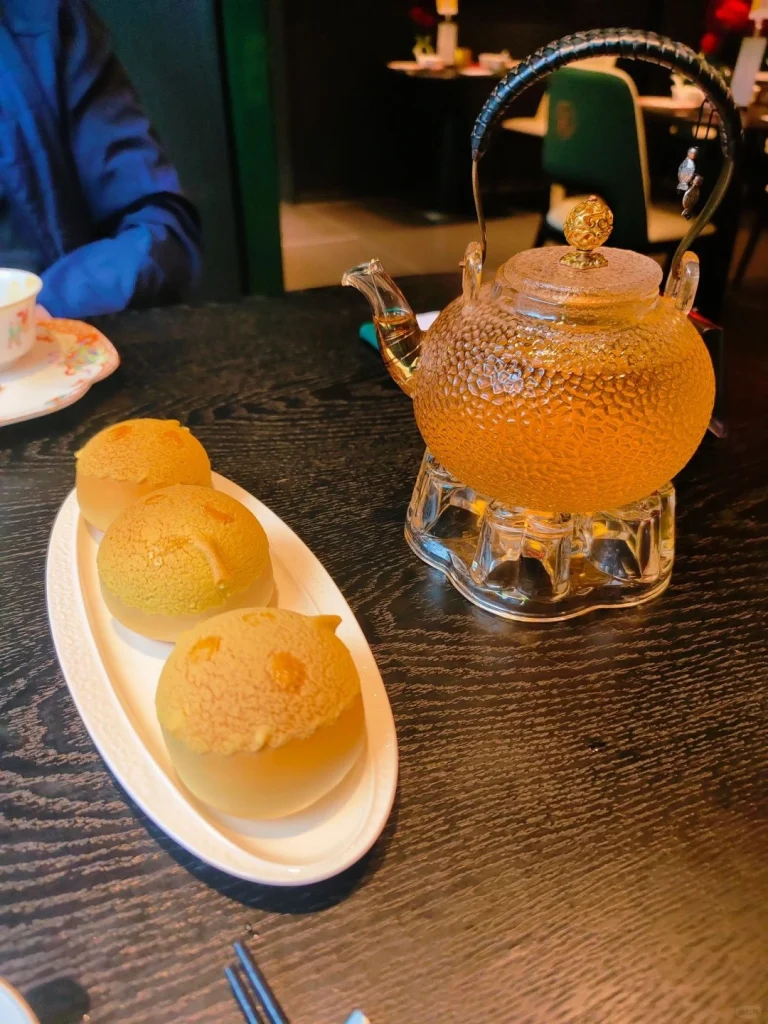 Dim sum and teapot on table at Lianxianglou Guangzhou