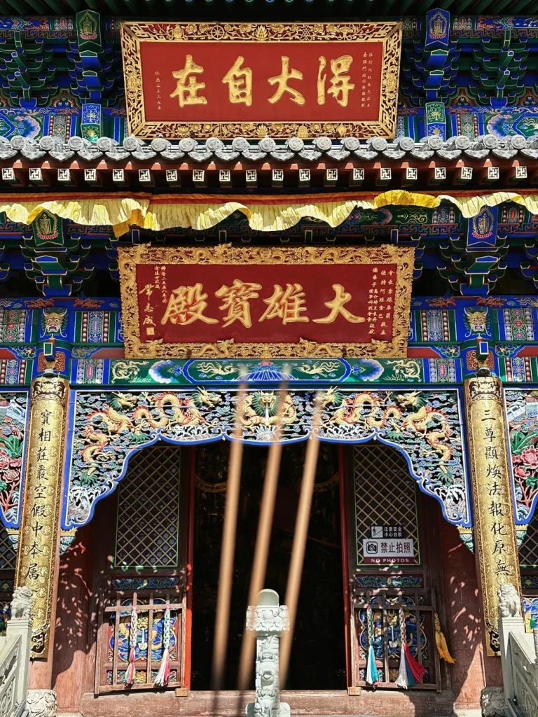 Historical Buddhist art and caves in Datong showcasing intricate sculptures and religious significance in Shanxi province