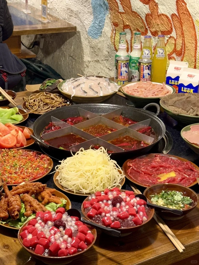 Hotpot near LiZiBa Light Rail in Chongqing Famous spicy hotpot with a variety of fresh meats and veggies
