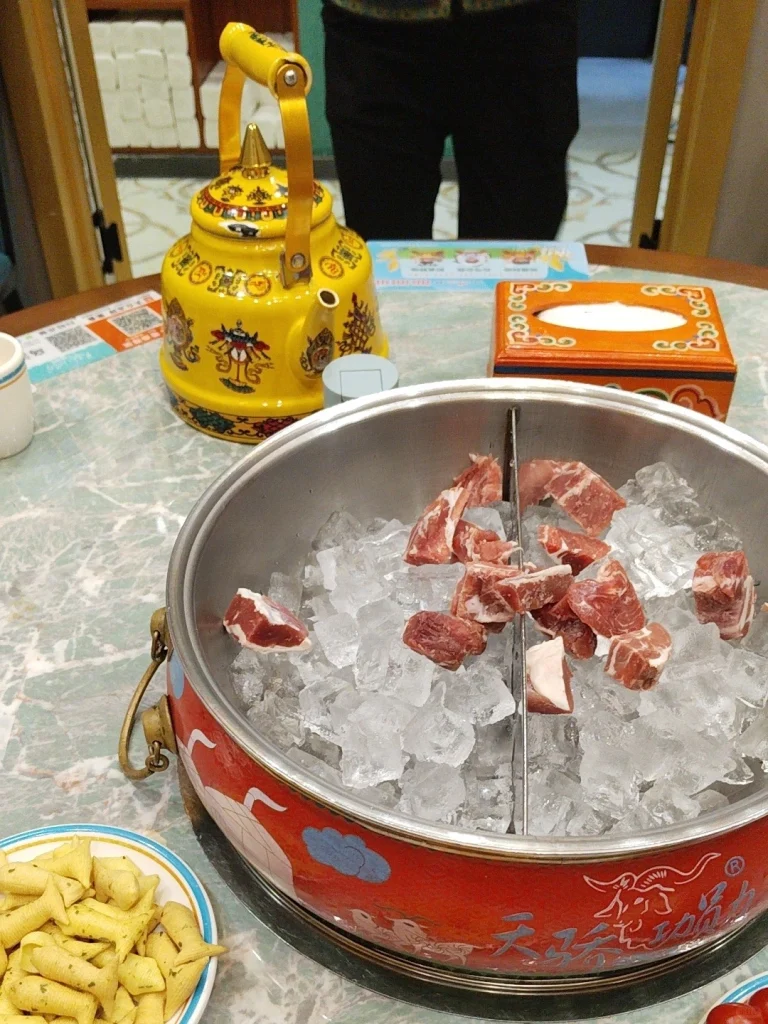 Inner Mongolia style Hot Pot Ice bedded mutton in a decorated hot pot