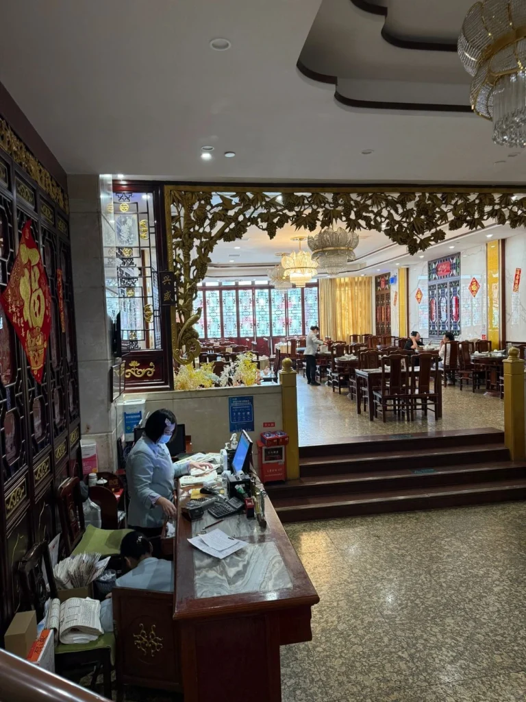 Interior cashier area of Lianxianglou Guangzhou with traditional design