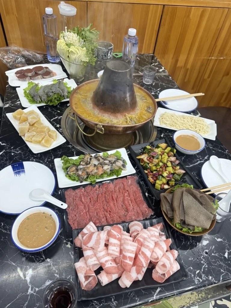 Northeast Hot Pot Ingredients Meats seafood and sauces ready for cooking