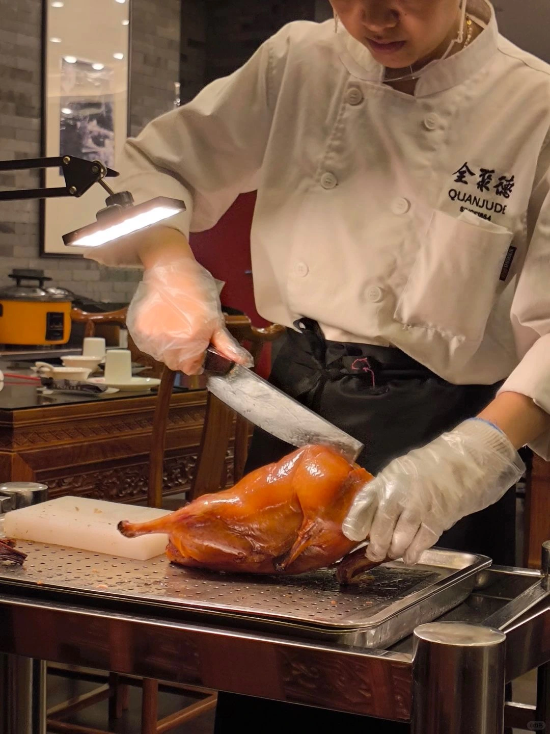 Peking Duck served at Quan Jude A plate of sliced Peking Duck served with traditional condiments at Quan Jude restaurant in Beijing