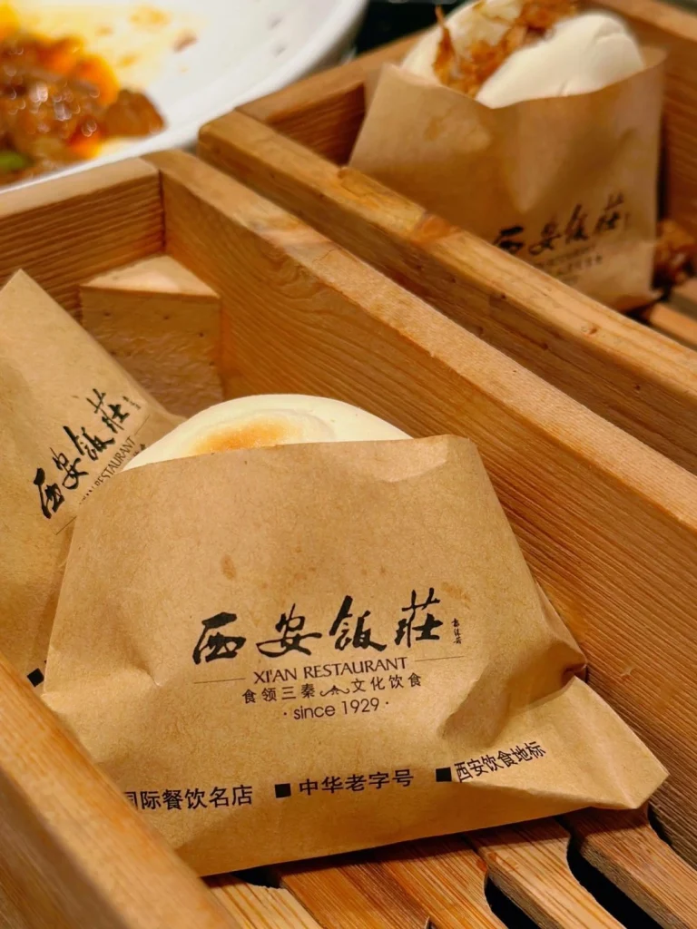 Xian Restaurant packaging A close up of Xian Restaurants packaging for their signature dishes neatly packed in branded bags