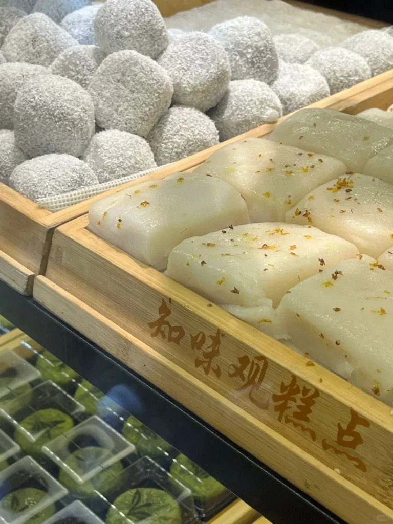 Zhiwei Guan famous desserts A display of various traditional desserts at Zhiwei Guan including chewy rice cakes and pastries