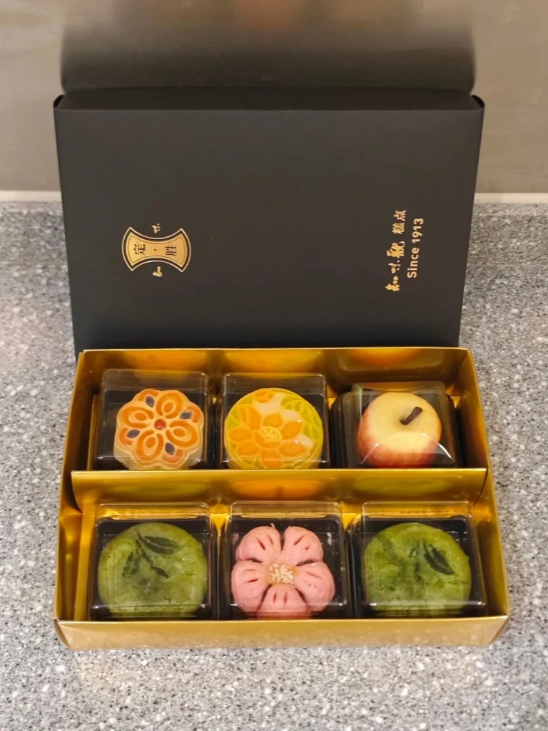 Zhiwei Guan mooncakes Artistic box filled with delicately crafted mooncakes from Zhiwei Guan showcasing traditional flavors
