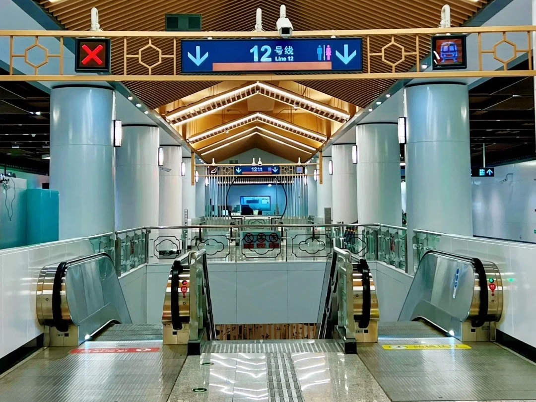 Beijing Line 12 metro station interior Stylish and well lit interior of a Beijing subway station with wooden ceiling design. - How Much Money Do You Need Per Day in Beijing? 2026 - The China Journey Beijing Line 12 metro station interior Stylish and well lit interior of a Beijing subway station with wooden ceiling design. - How Much Money Do You Need Per Day in Beijing? 2026 - The China Journey