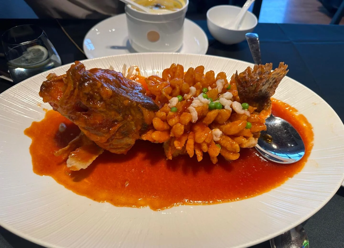 Close up of Suzhou - What to Eat in Suzhou: Local Food Guide 2026 - The China Journey's famous sweet and sour squirrel shaped Mandarin fish dish Close up of Suzhou - What to Eat in Suzhou: Local Food Guide 2026 - The China Journey's famous sweet and sour squirrel shaped Mandarin fish dish