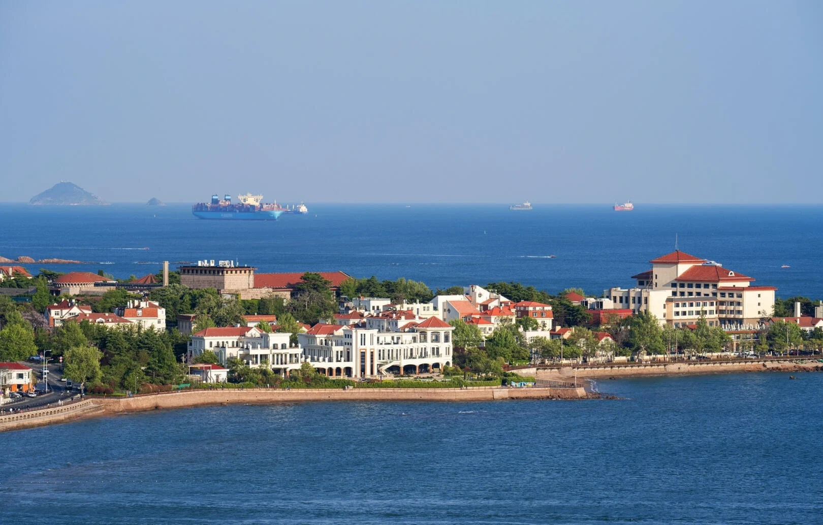 Seaside Architecture and Blue Ocean at Badaguan Scenic Area, Qingdao - Where to Stay in Qingdao: Best Areas & Hotels 2026 - The China Journey Seaside Architecture and Blue Ocean at Badaguan Scenic Area, Qingdao - Where to Stay in Qingdao: Best Areas & Hotels 2026 - The China Journey
