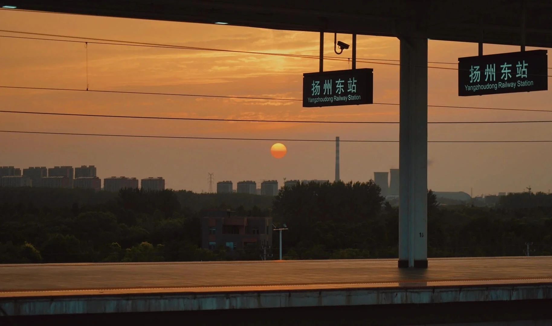Sunset view from Yangzhou East Railway Station platform - Where to Stay in Yangzhou: Best Areas & Hotels 2026 - The China Journey Sunset view from Yangzhou East Railway Station platform - Where to Stay in Yangzhou: Best Areas & Hotels 2026 - The China Journey