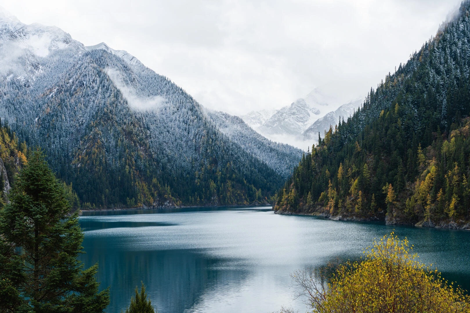 Long Lake Snowy peaks above deep blue alpine lake - Jiuzhaigou Guide: Routes, Tips & Seasons 2026 - The China Journey Long Lake Snowy peaks above deep blue alpine lake - Jiuzhaigou Guide: Routes, Tips & Seasons 2026 - The China Journey