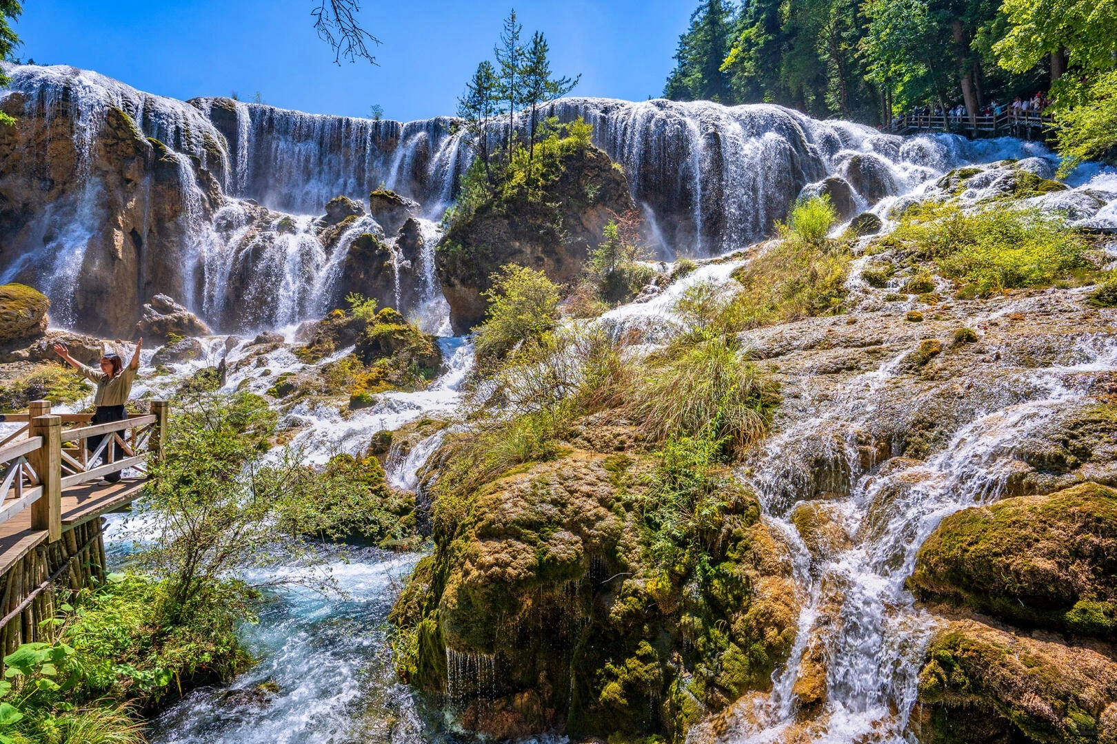Pearl Shoal Waterfall Wide cascading waterfall over rocky terraces - Jiuzhaigou Guide: Routes, Tips & Seasons 2026 - The China Journey Pearl Shoal Waterfall Wide cascading waterfall over rocky terraces - Jiuzhaigou Guide: Routes, Tips & Seasons 2026 - The China Journey