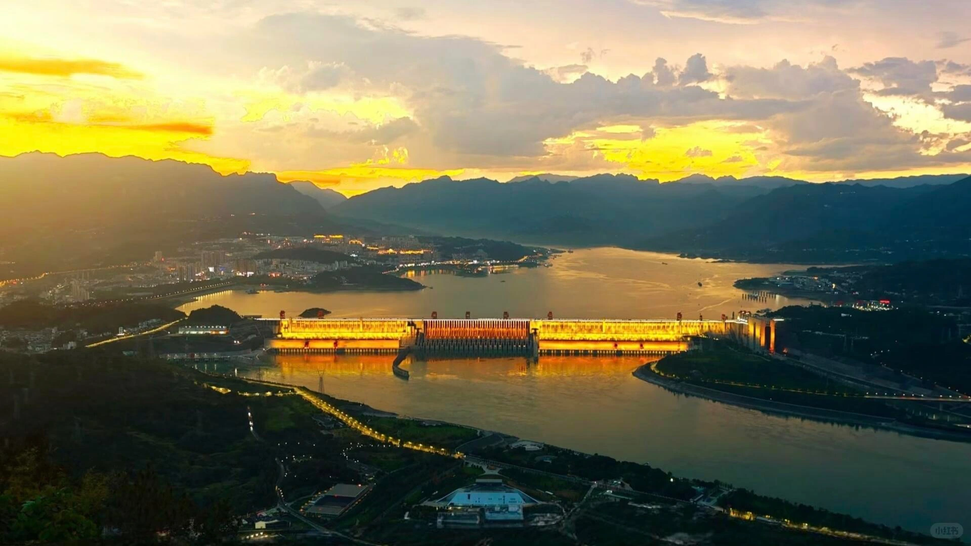Three Gorges Dam at sunset on the Yangtze River with illuminated hydroelectric power station and surrounding mountains - Yangtze River (Chang Jiang): Cruise Guide, Map & Top Sights 2026 - The China Journey Three Gorges Dam at sunset on the Yangtze River with illuminated hydroelectric power station and surrounding mountains - Yangtze River (Chang Jiang): Cruise Guide, Map & Top Sights 2026 - The China Journey