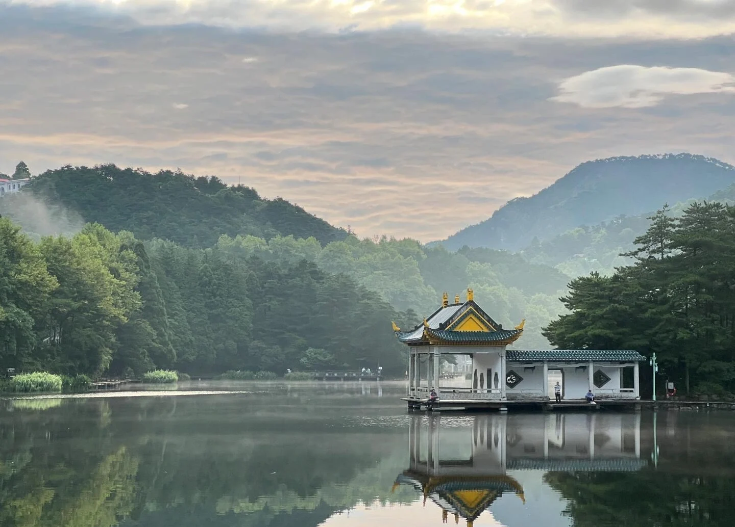 Lushan Ruqin Lake Pavilion Reflection Tranquil lakeside pavilion mirrored in water surrounded by misty forest mountains Jiangxi - Jiangxi Travel Guide: Routes, Tips & Itineraries 2026 - The China Journey Lushan Ruqin Lake Pavilion Reflection Tranquil lakeside pavilion mirrored in water surrounded by misty forest mountains Jiangxi - Jiangxi Travel Guide: Routes, Tips & Itineraries 2026 - The China Journey