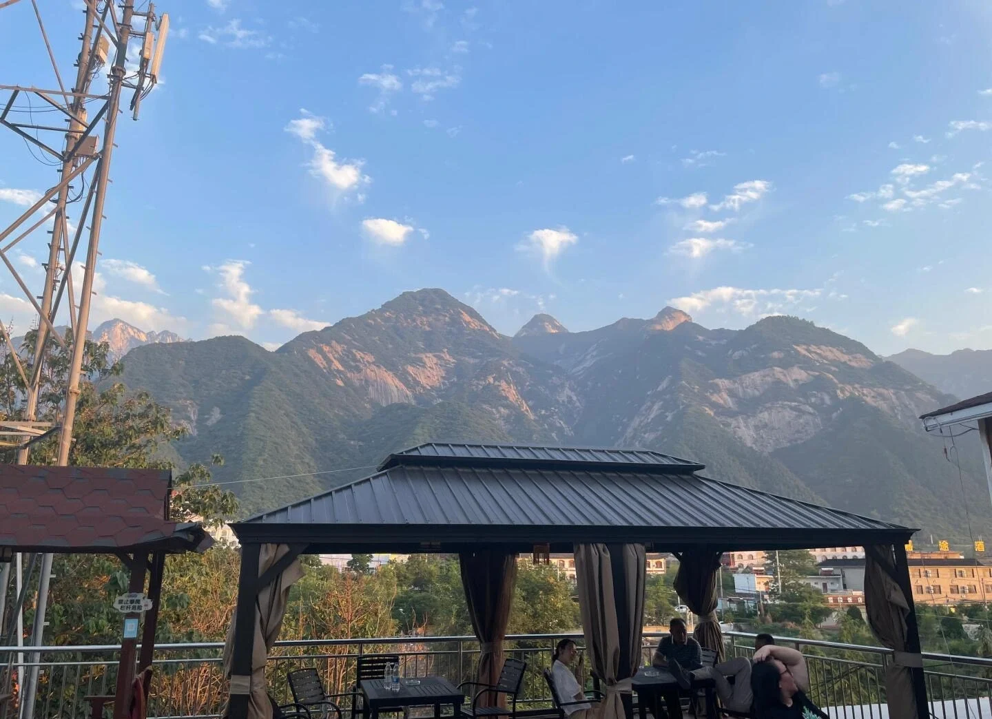 Mount Huashan Mountain View Hotel – outdoor terrace overlooking Huashan peaks and evening sky at mountain foothills - Mount Huashan Travel Guide: Best Routes, Tips & Day Trip 2026 - The China Journey Mount Huashan Mountain View Hotel – outdoor terrace overlooking Huashan peaks and evening sky at mountain foothills - Mount Huashan Travel Guide: Best Routes, Tips & Day Trip 2026 - The China Journey