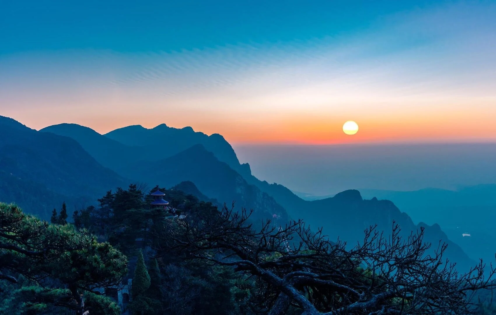Mount Lushan Sunrise Landscape Mountain silhouettes with glowing sunrise sky and scenic viewpoints in Jiangxi famous UNESCO site - Jiangxi Travel Guide: Routes, Tips & Itineraries 2026 - The China Journey Mount Lushan Sunrise Landscape Mountain silhouettes with glowing sunrise sky and scenic viewpoints in Jiangxi famous UNESCO site - Jiangxi Travel Guide: Routes, Tips & Itineraries 2026 - The China Journey
