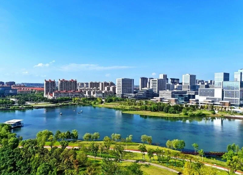Nanchang Modern City Lake View Urban skyline with lakeside park greenery under clear blue sky in summer Jiangxi - Jiangxi Travel Guide: Routes, Tips & Itineraries 2026 - The China Journey Nanchang Modern City Lake View Urban skyline with lakeside park greenery under clear blue sky in summer Jiangxi - Jiangxi Travel Guide: Routes, Tips & Itineraries 2026 - The China Journey
