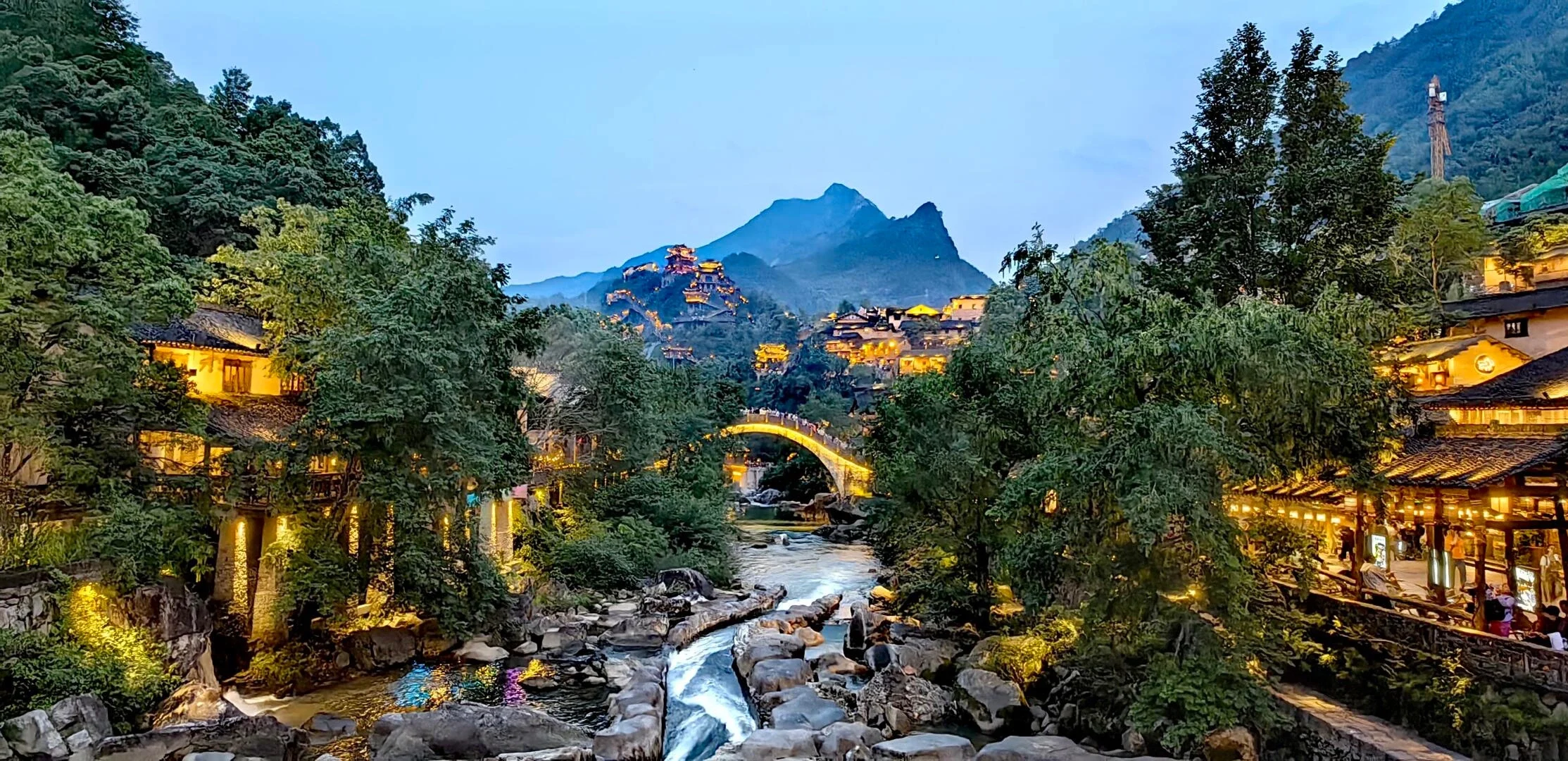 Wangxiangu Valley Night Scenic Area Illuminated ancient style buildings and bridge over river with mountain backdrop Jiangxi - Jiangxi Travel Guide: Routes, Tips & Itineraries 2026 - The China Journey Wangxiangu Valley Night Scenic Area Illuminated ancient style buildings and bridge over river with mountain backdrop Jiangxi - Jiangxi Travel Guide: Routes, Tips & Itineraries 2026 - The China Journey