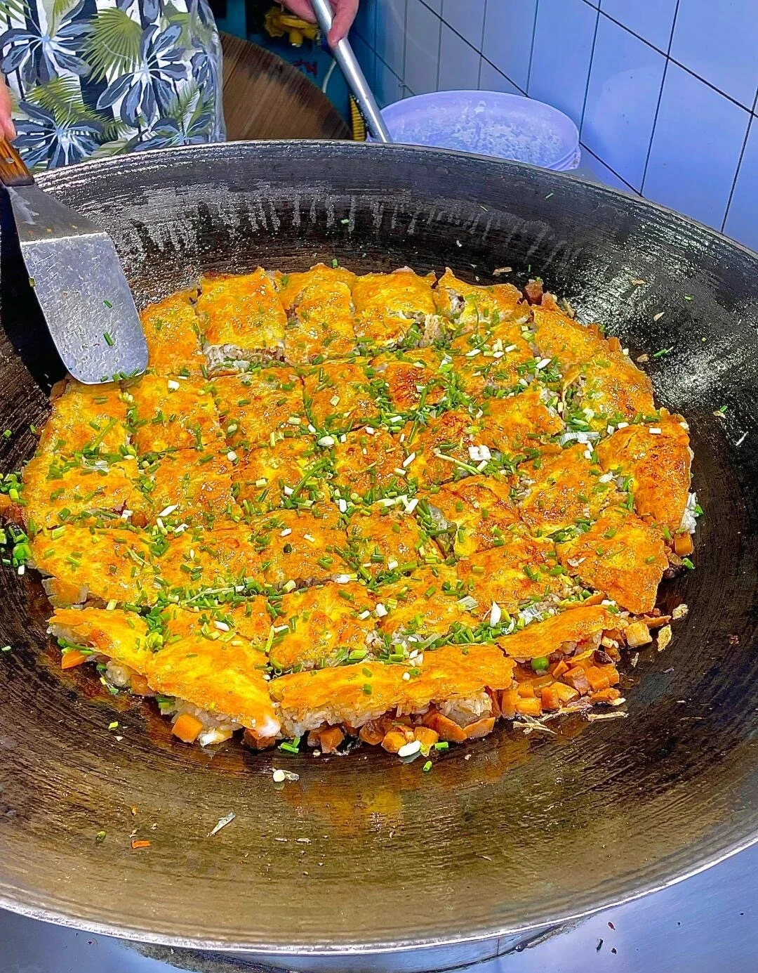 Wuhan Sanxian Doupi Street Food Crispy rice and egg pancake stuffed with meat vegetables cooking in large pan - What to Eat in Wuhan: Local Food Guide 2026 - The China Journey Wuhan Sanxian Doupi Street Food Crispy rice and egg pancake stuffed with meat vegetables cooking in large pan - What to Eat in Wuhan: Local Food Guide 2026 - The China Journey
