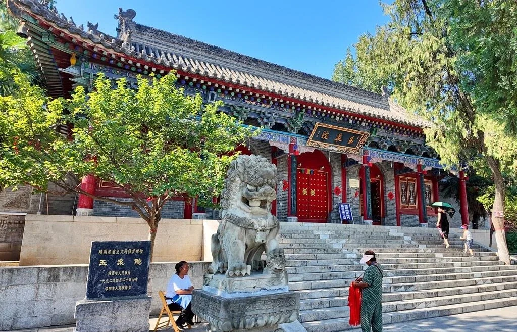 Yuquan Temple at Mount Huashan – traditional Chinese temple entrance with stone lion statue and colorful architecture - Mount Huashan Travel Guide: Best Routes, Tips & Day Trip 2026 - The China Journey Yuquan Temple at Mount Huashan – traditional Chinese temple entrance with stone lion statue and colorful architecture - Mount Huashan Travel Guide: Best Routes, Tips & Day Trip 2026 - The China Journey