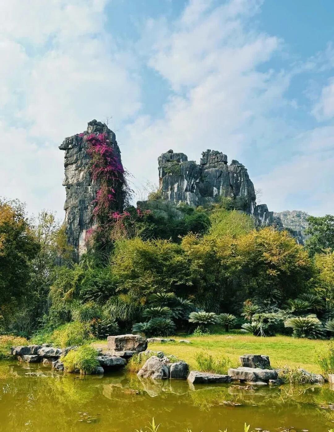 Seven Star Park Guilin Karst Landscape Dramatic limestone peaks lush greenery and tranquil pond reflecting iconic Guilin scenery - Where to Stay in Guilin: Best Areas & Hotels 2026 - The China Journey Seven Star Park Guilin Karst Landscape Dramatic limestone peaks lush greenery and tranquil pond reflecting iconic Guilin scenery - Where to Stay in Guilin: Best Areas & Hotels 2026 - The China Journey