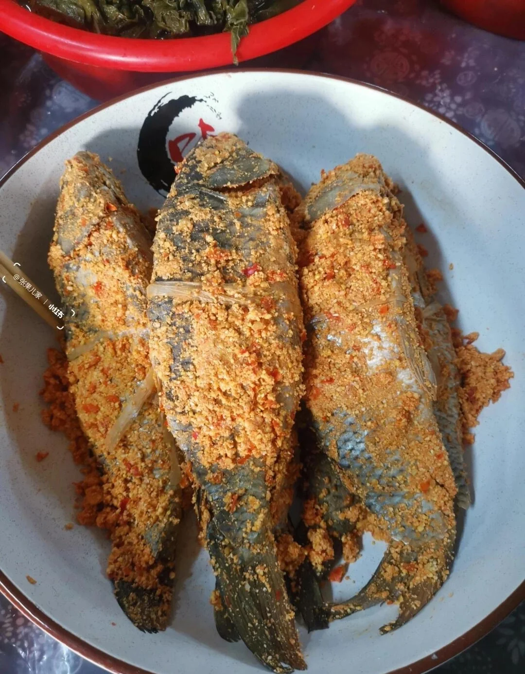 Suanzuo Fish Zhangjiajie fermented fish coated with spicy rice seasoning - What to Eat in Zhangjiajie: Local Food Guide 2026 - The China Journey Suanzuo Fish Zhangjiajie fermented fish coated with spicy rice seasoning - What to Eat in Zhangjiajie: Local Food Guide 2026 - The China Journey