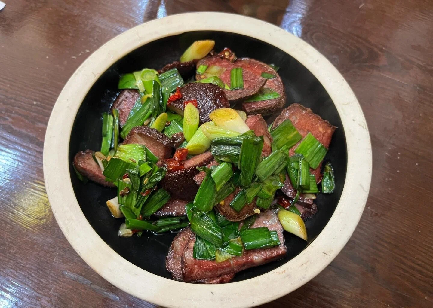 Tujia Blood Tofu Stir fried Zhangjiajie blood tofu with garlic greens - What to Eat in Zhangjiajie: Local Food Guide 2026 - The China Journey Tujia Blood Tofu Stir fried Zhangjiajie blood tofu with garlic greens - What to Eat in Zhangjiajie: Local Food Guide 2026 - The China Journey