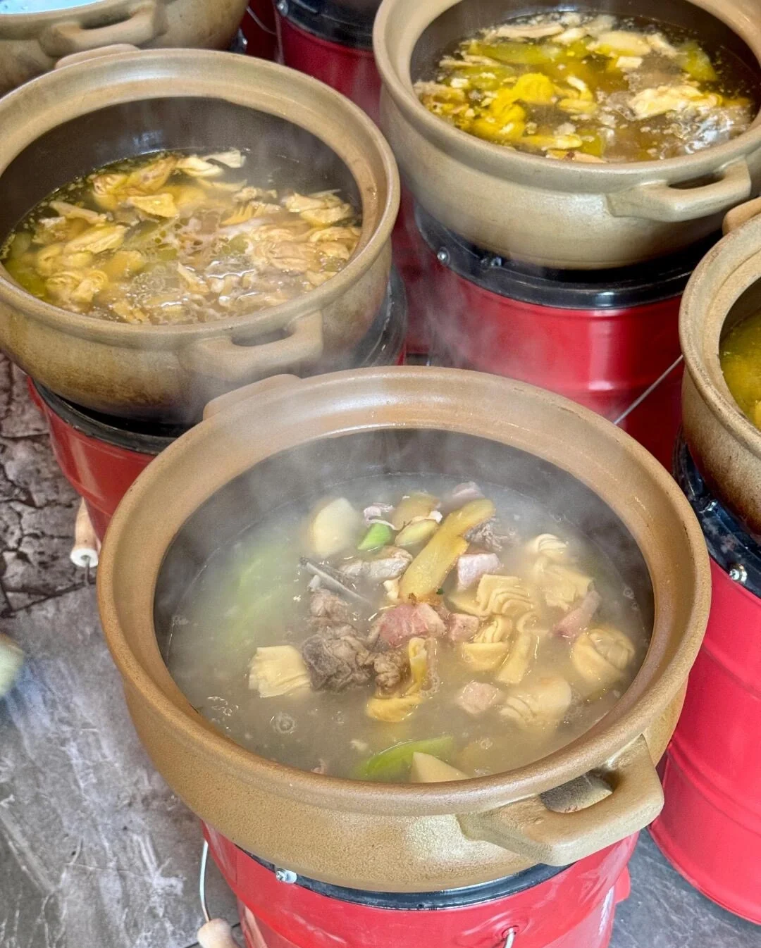 Yan Du Xian Soup Suzhou bamboo shoot and pork soup simmering in clay pots - What to Eat in Suzhou: Local Food Guide 2026 - The China Journey Yan Du Xian Soup Suzhou bamboo shoot and pork soup simmering in clay pots - What to Eat in Suzhou: Local Food Guide 2026 - The China Journey