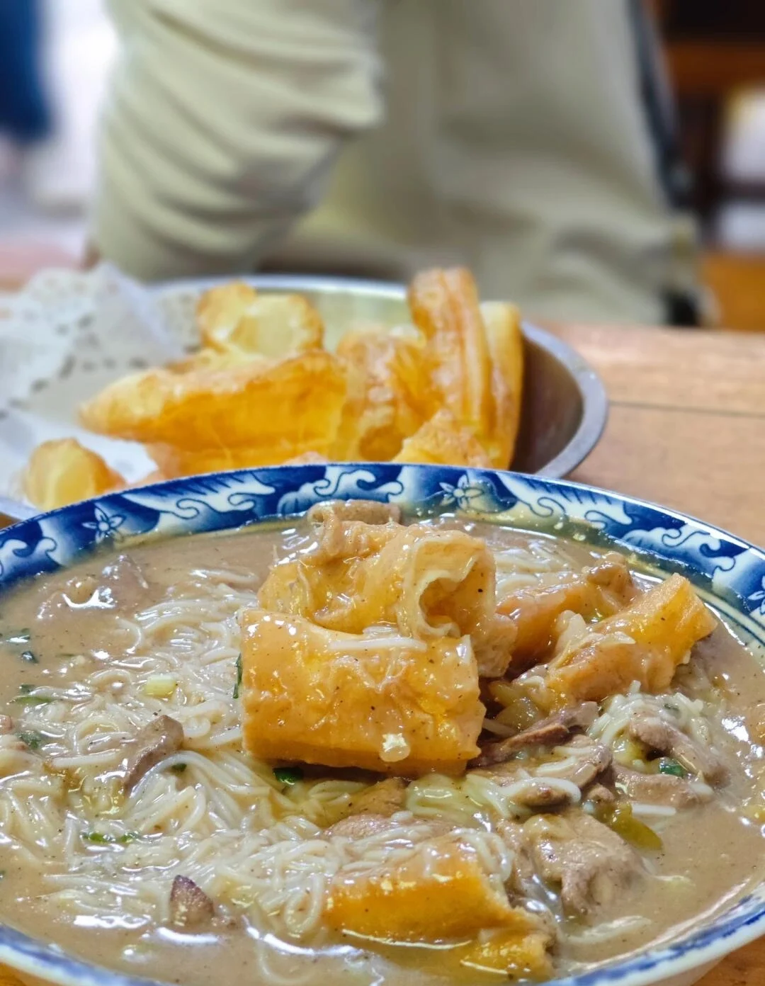 Fish Broth Rice Noodles Wuhan breakfast noodles with fried dough and thick fish soup - What to Eat in Wuhan: Local Food Guide 2026 - The China Journey Fish Broth Rice Noodles Wuhan breakfast noodles with fried dough and thick fish soup - What to Eat in Wuhan: Local Food Guide 2026 - The China Journey