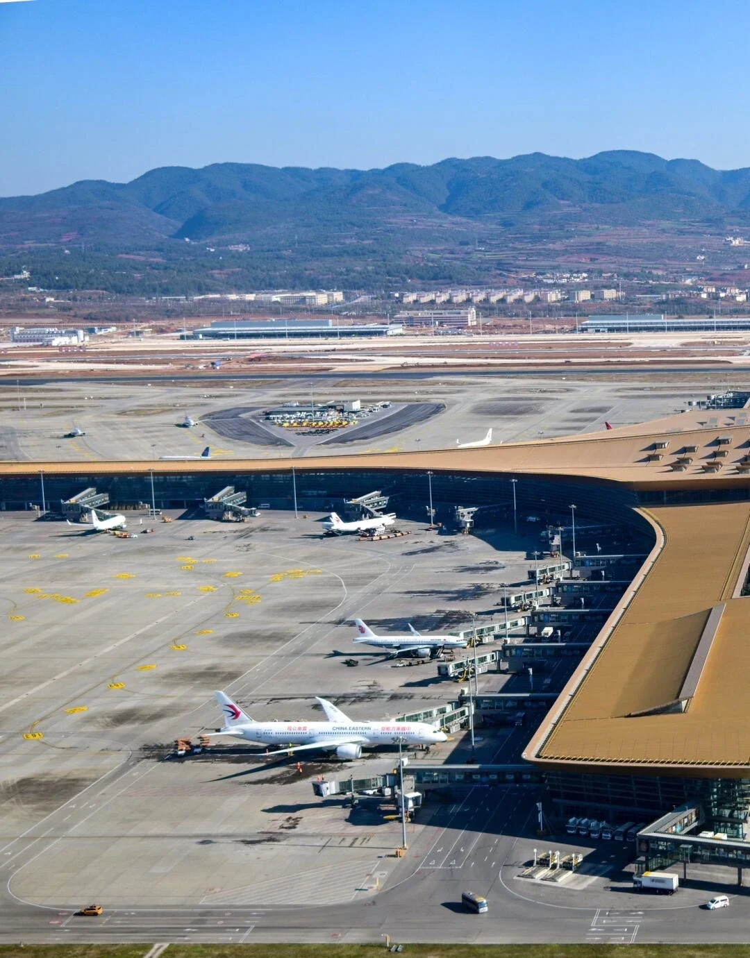Lapangan Terbang Changshui Kunming, terminal dan landasan utama untuk pengembara yang tiba di Yunnan - 7 Hari di Kunming: Itinerari Terbaik untuk Pelawat Kali Pertama 2026 - The China Journey Lapangan Terbang Changshui Kunming, terminal dan landasan utama untuk pengembara yang tiba di Yunnan - 7 Hari di Kunming: Itinerari Terbaik untuk Pelawat Kali Pertama 2026 - The China Journey