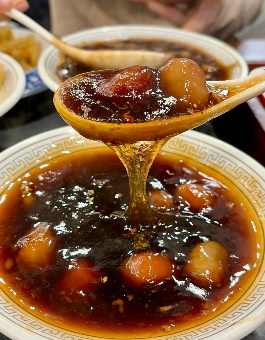 Osmanthus Sweet Taro Nanjing dessert soup with sticky taro and floral syrup - What to Eat in Nanjing: Local Food Guide 2026 - The China Journey Osmanthus Sweet Taro Nanjing dessert soup with sticky taro and floral syrup - What to Eat in Nanjing: Local Food Guide 2026 - The China Journey