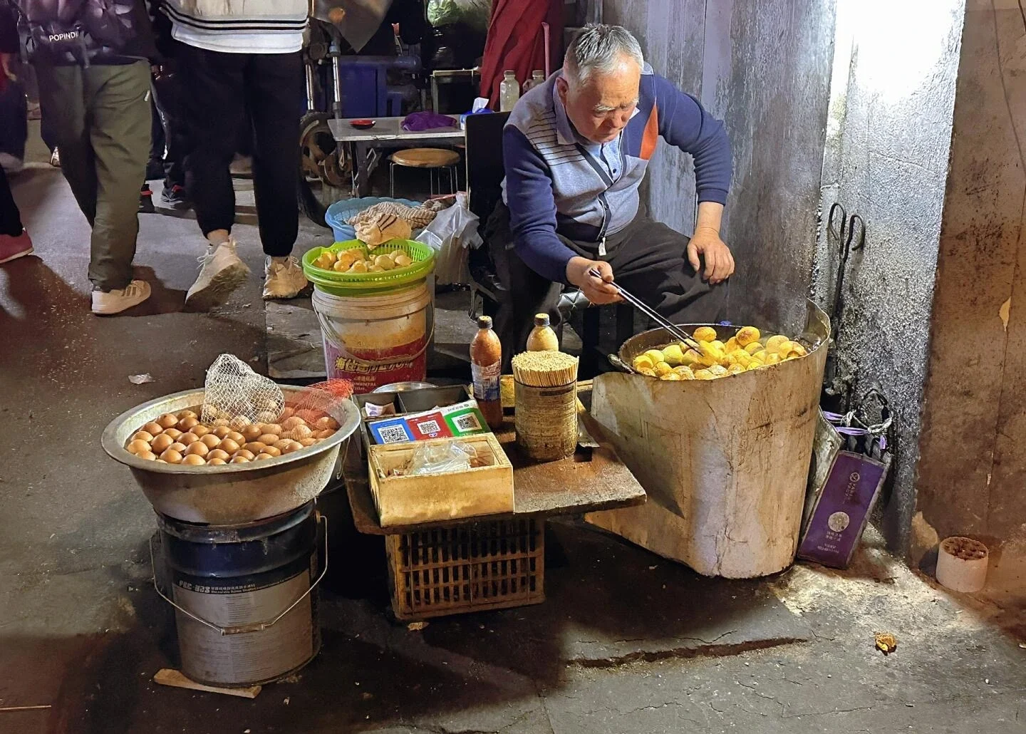 Wang Chicken Eggs Nanjing street vendor cooking eggs at a local food stall - What to Eat in Nanjing: Local Food Guide 2026 - The China Journey Wang Chicken Eggs Nanjing street vendor cooking eggs at a local food stall - What to Eat in Nanjing: Local Food Guide 2026 - The China Journey